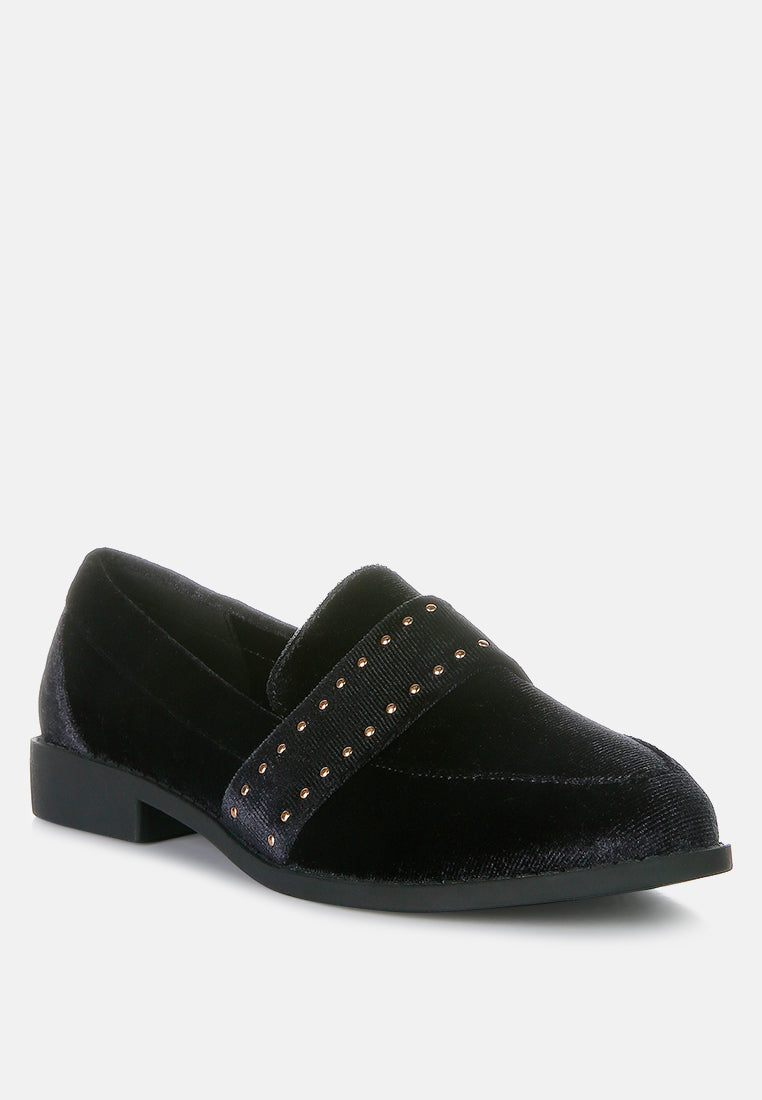 Black velvet loafers with gold studded band across the vamp
