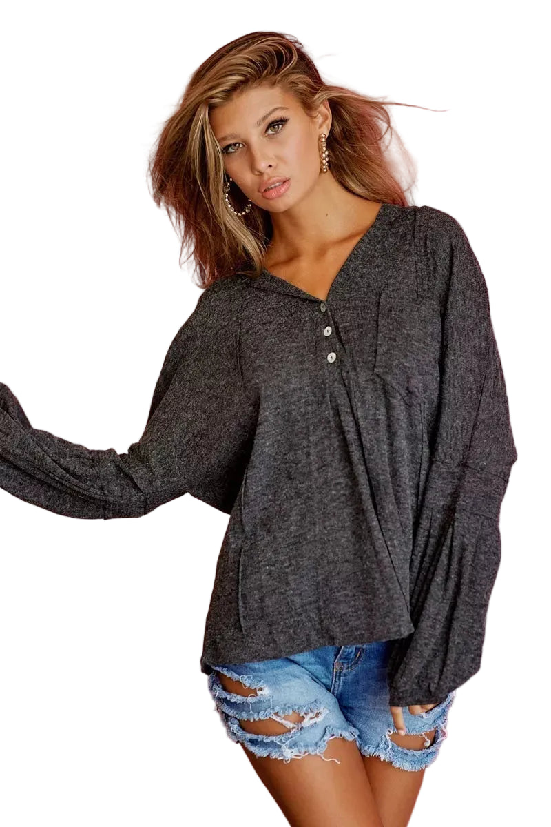 Dark gray textured knit hoodie with buttoned placket and long sleeves