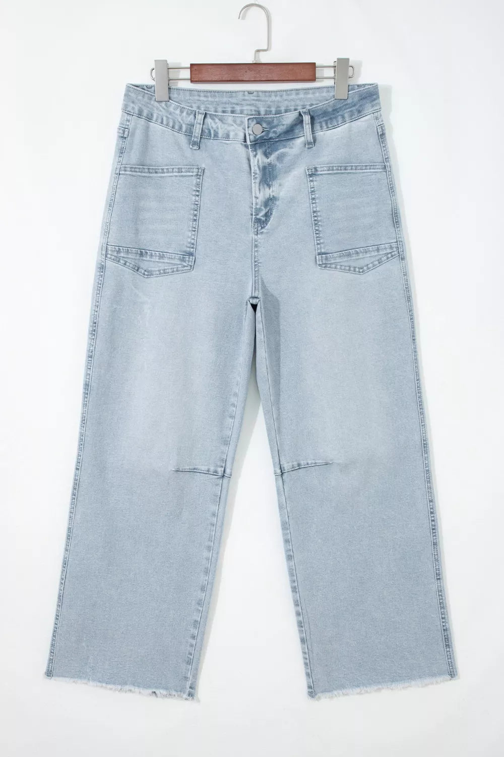 Trendsi light wash straight-leg jeans on hanger, light blue denim with utility pockets