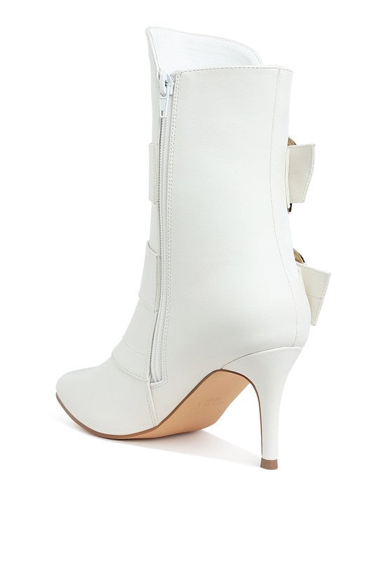 White ankle boots with side zipper and two buckle straps, high slim heel