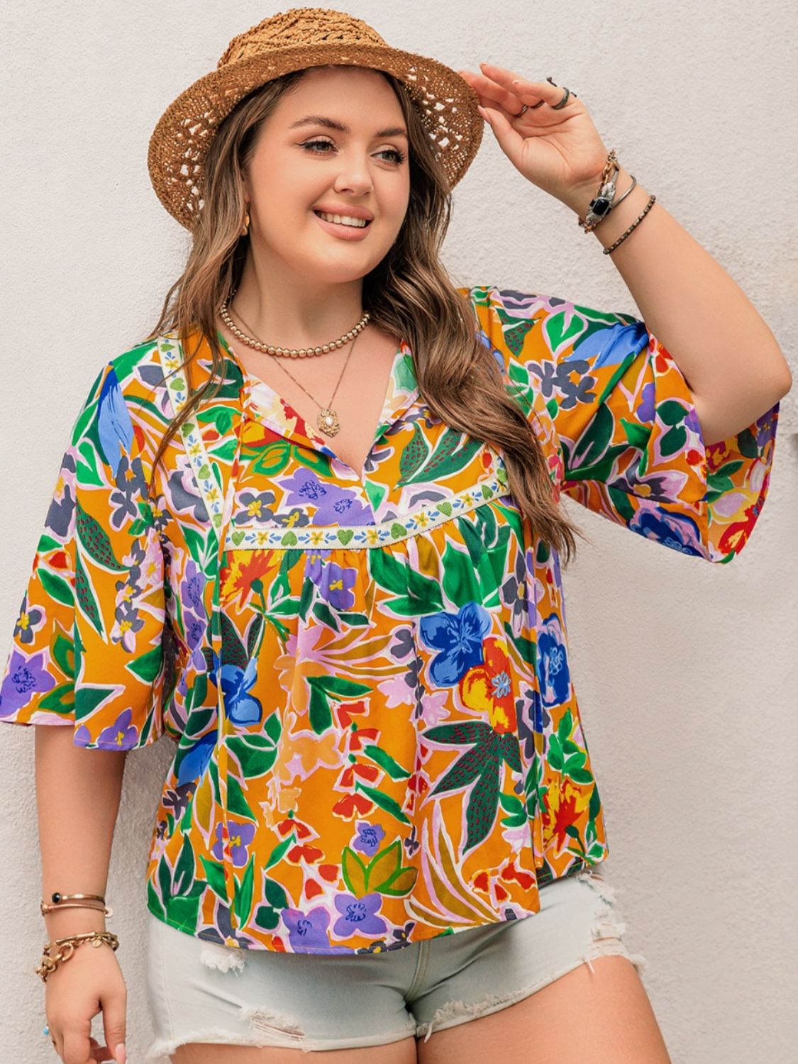 Plus Size Printed Tie Neck Half Sleeve Blouse - Tigbul's Variety Fashion Shop