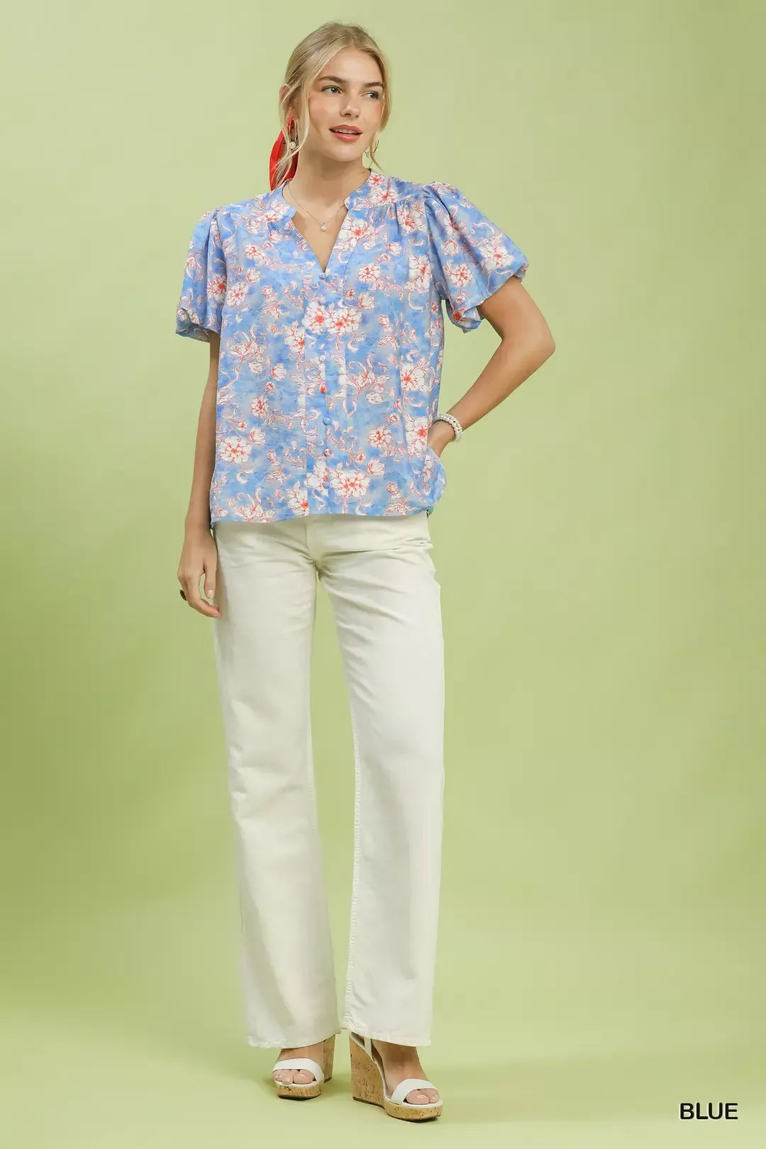 Blue floral button-front short-sleeve blouse with V-neck and relaxed fit