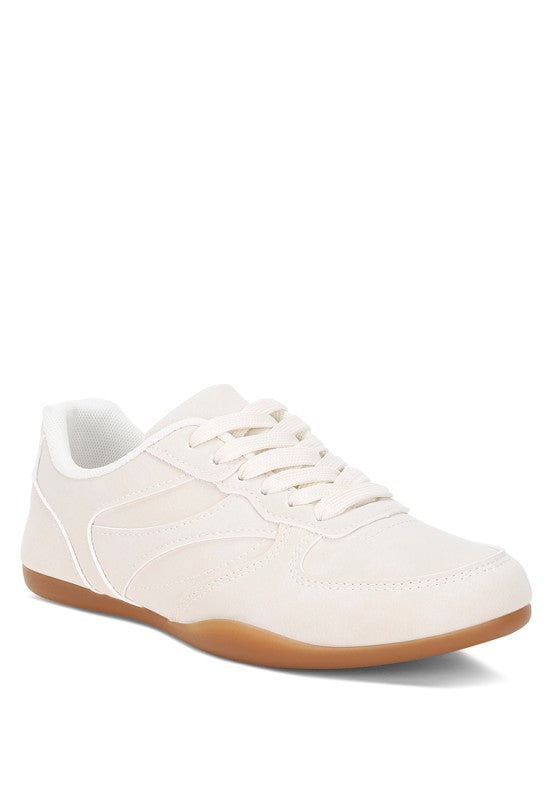 Ivory lace-up everyday sneakers with cushioned collar, rounded toe, and gum sole