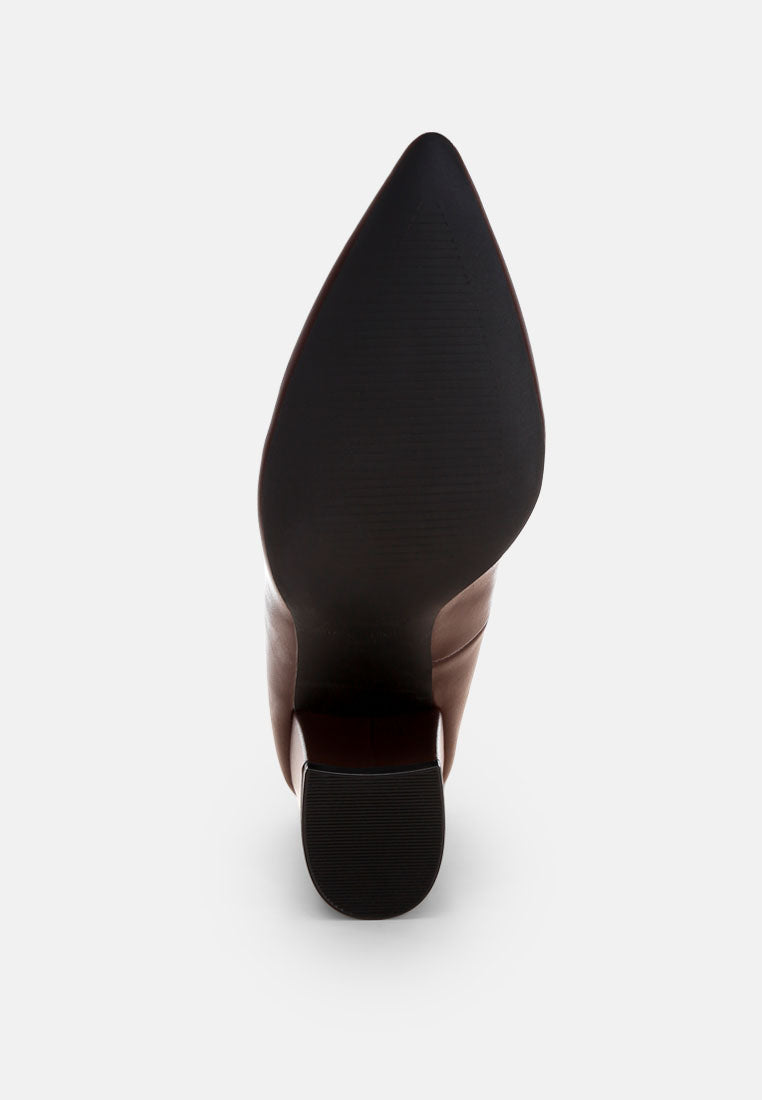 Brown faux leather pump sole and back heel view, textured rubber grip