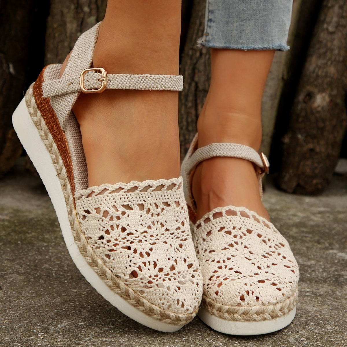 Ivory woven espadrille sandals with open-toe design, ankle buckle strap and jute wedge sole
