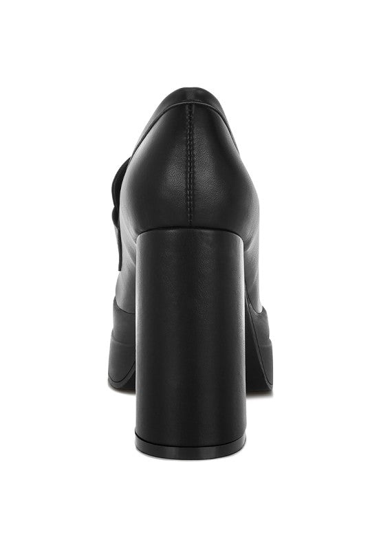 Black heeled loafer back view with high block heel and closed square toe