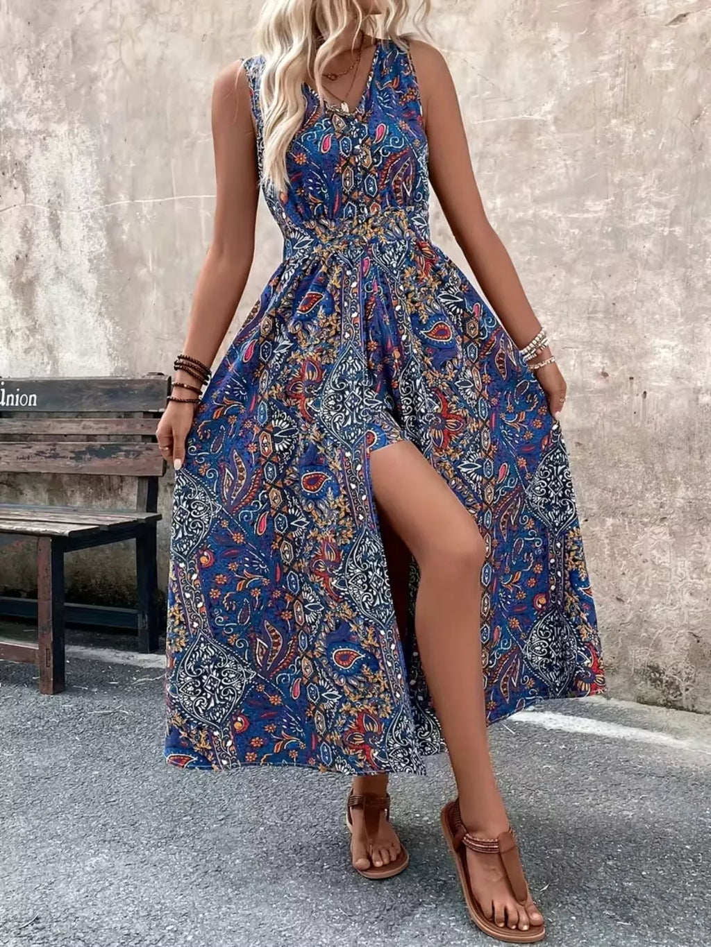 Peacock blue paisley sleeveless romper with long top, V-neck and thigh-length side slit