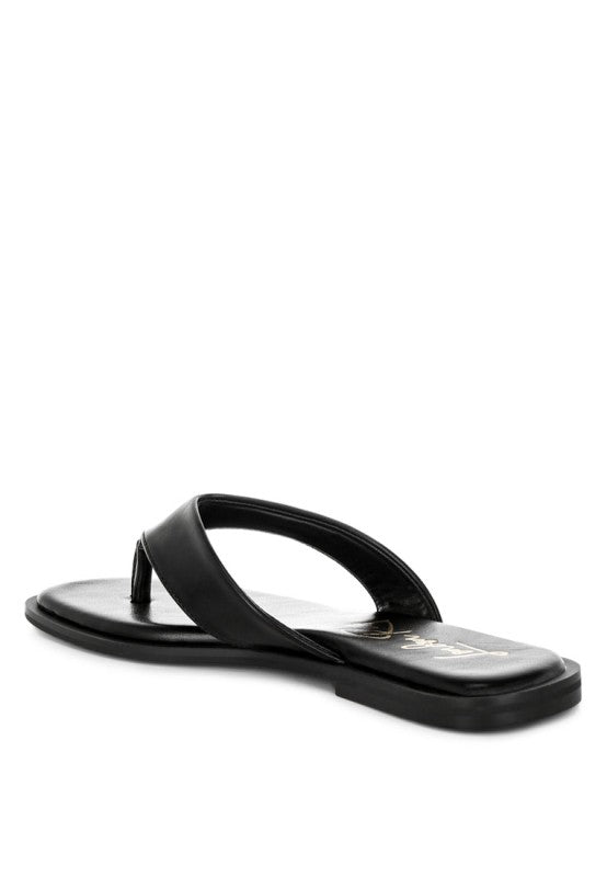 Black toe-post thong flat, front-side view with flat sole and square open toe