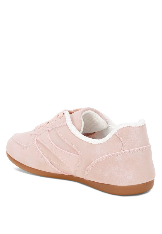 Back view of blush-pink lace-up sneakers with cushioned collar and gum sole