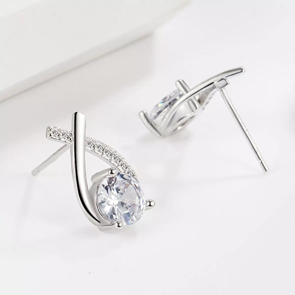 Sterling silver moissanite teardrop earrings with stud back and post closure