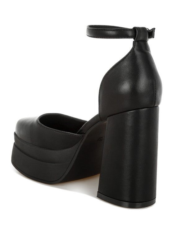 Black ankle strap heels with chunky square toe, platform sole, and block heel