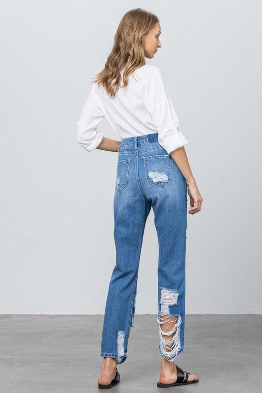 High-rise straight jeans, medium blue wash with back pockets and side rip details