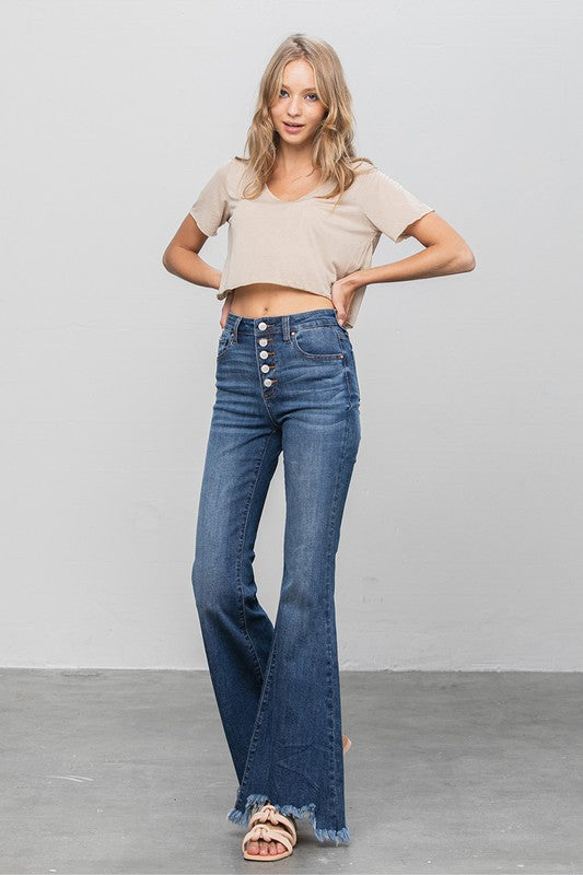 Dark denim wide-leg jeans with button closure and frayed bottom edge