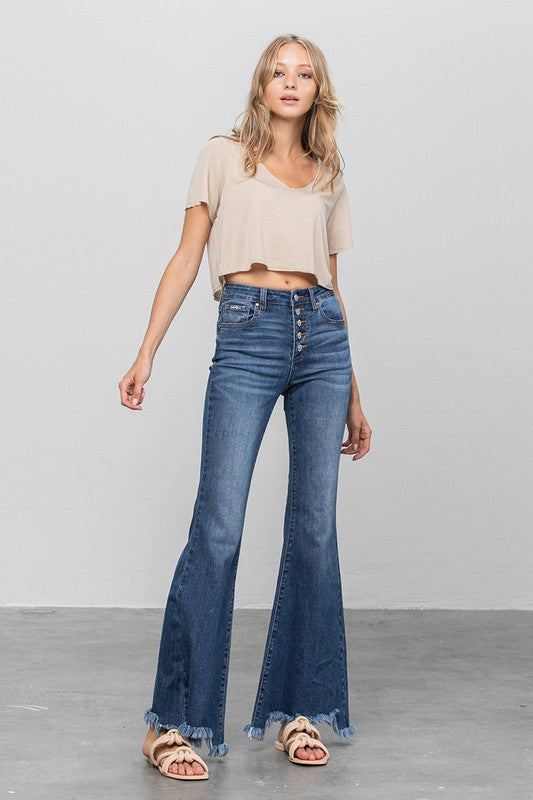 Dark blue flare jeans, button front, mid-rise waist, frayed cuffs