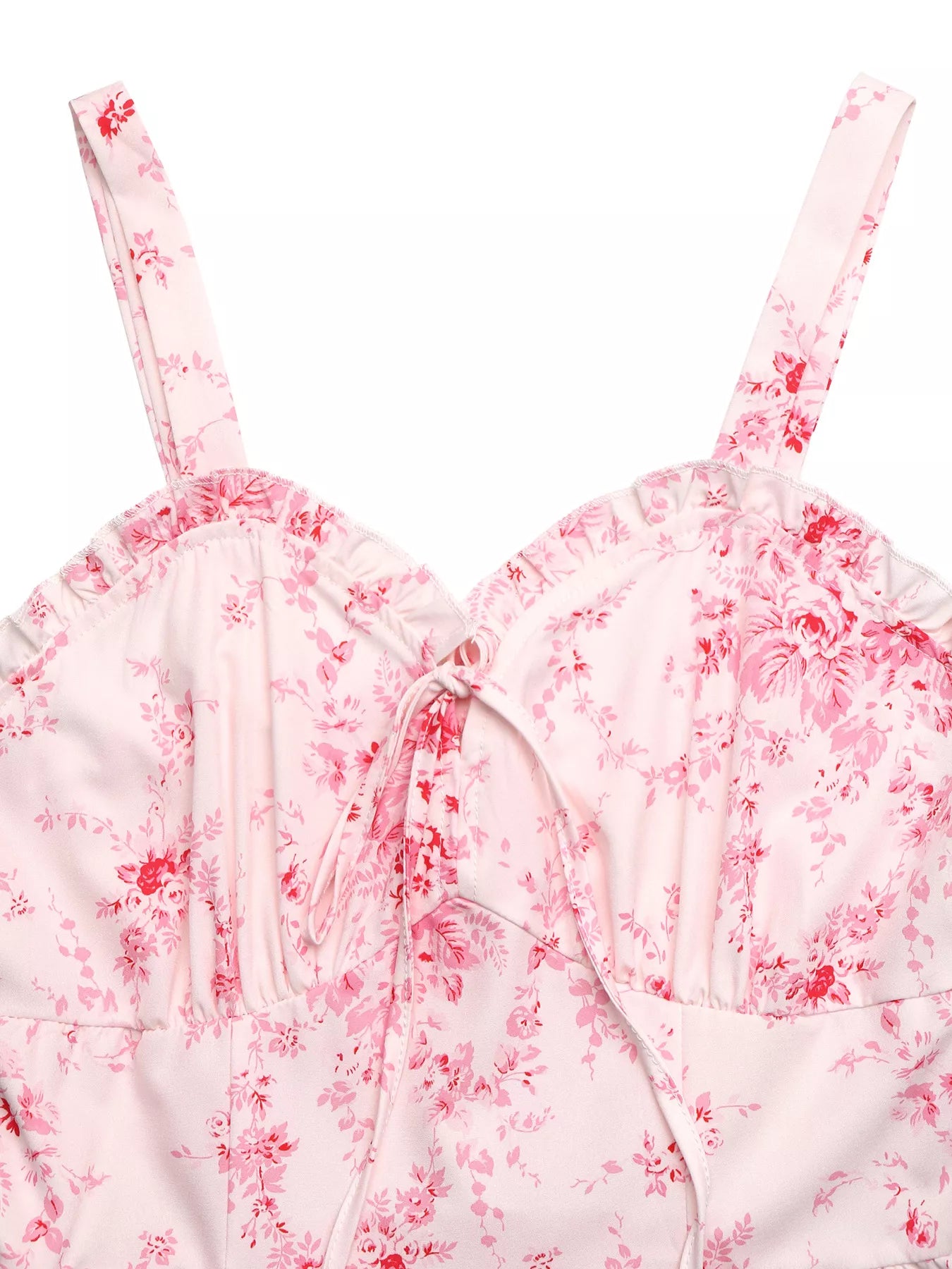 Close-up of pink floral cami dress bodice with ruffled frill and drawstring tie