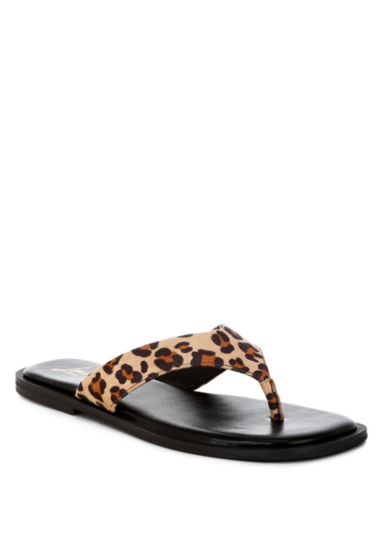 Leopard print thong flat sandal with black toe post and cushioned sole