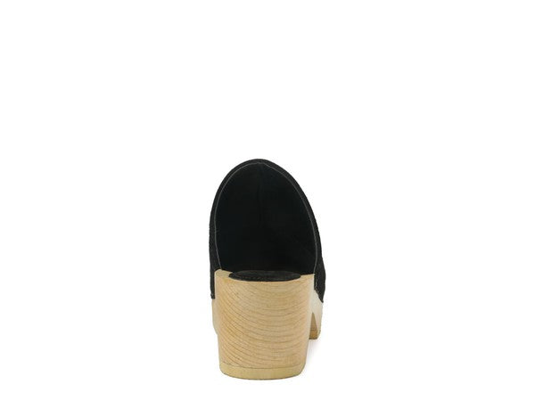 Darcie suede black clogs, back view with stacked light heel and platform