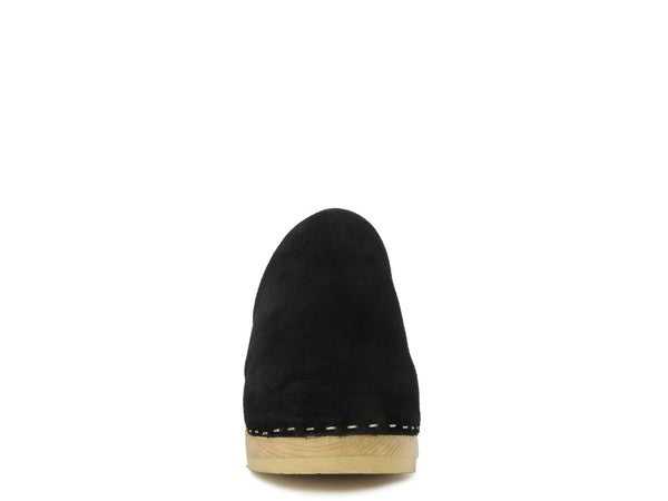 Darcie suede black clogs, toe-and-stitched edge close-up