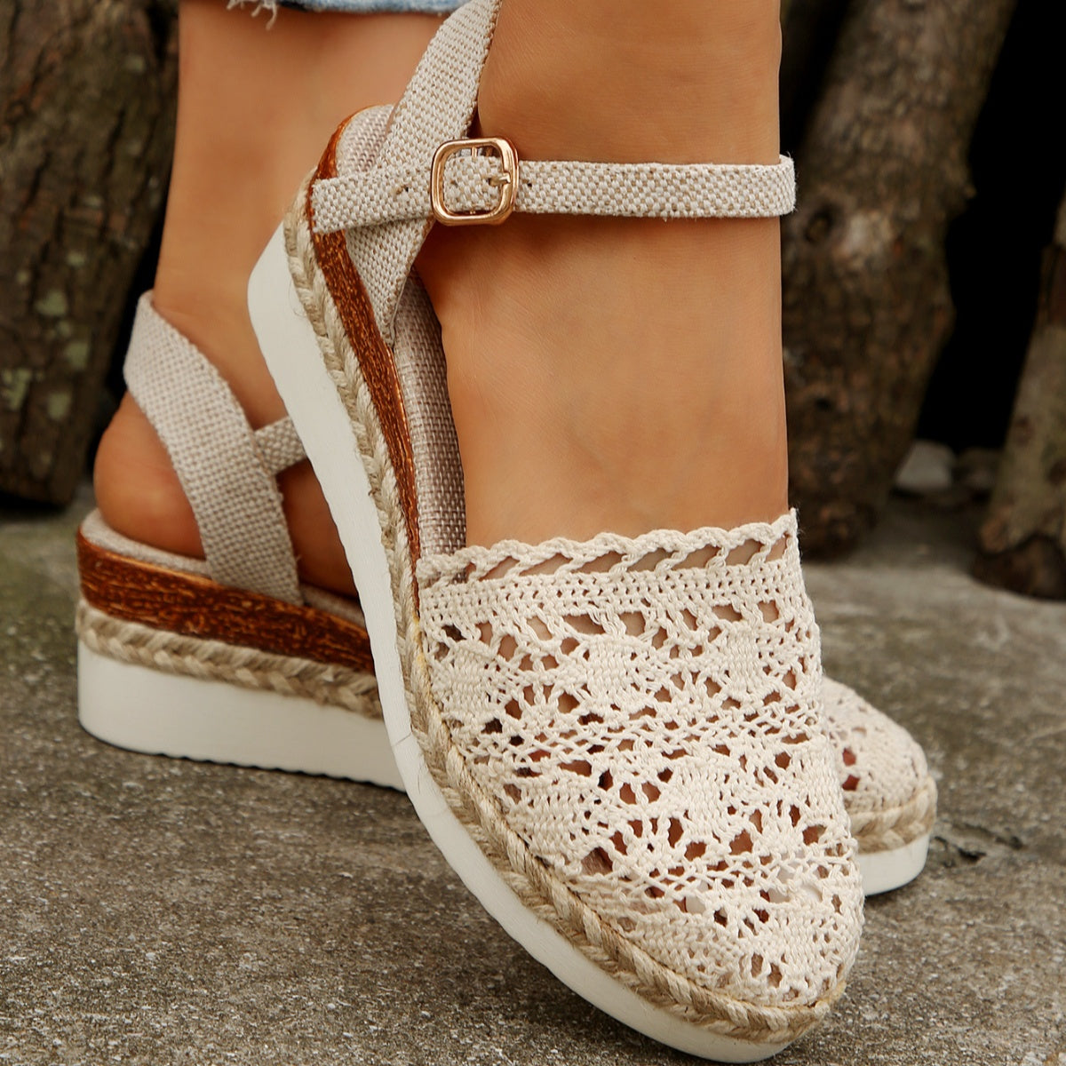 Ivory crochet espadrille sandals with ankle buckle strap and textured jute wedge heel