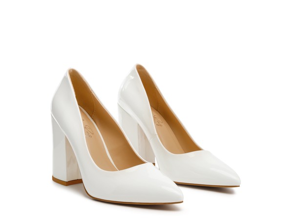 Kamira patent block heeled pumps, white pair with pointed toe and block heel.