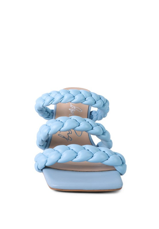 Light blue braided slide sandals with crisscross straps and open toe