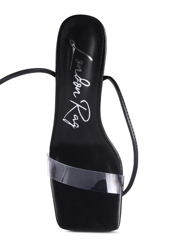 Black lace-up high heel sandal front view with clear strap and pointed toe