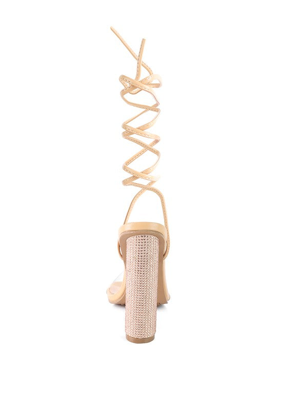 Latte high heel sandal back view with diamante block heel and lace-up ankle