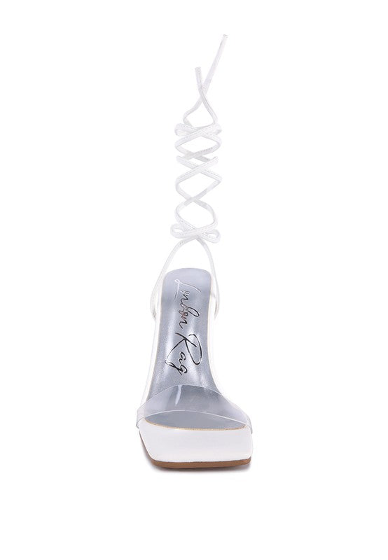White lace-up high heel sandal front view with rhinestone-style straps up the ankle