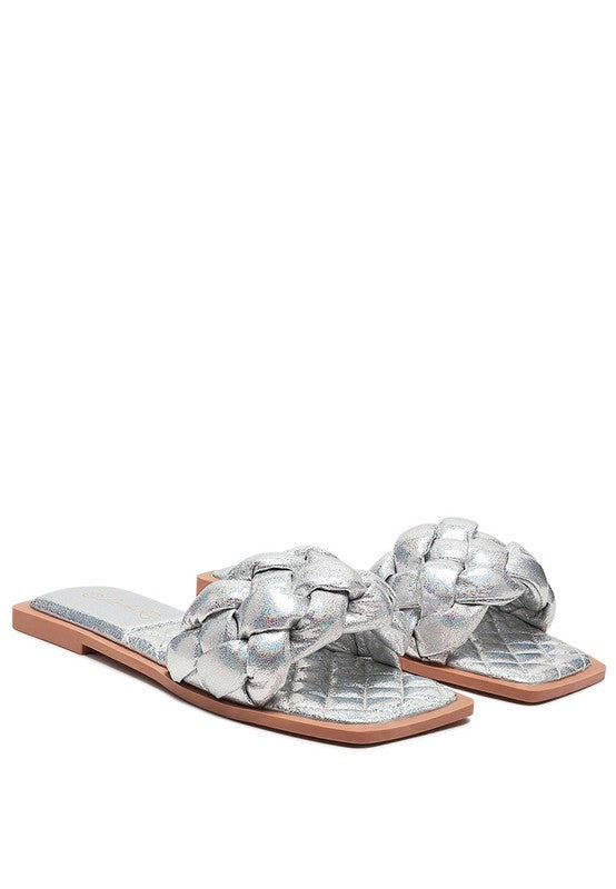Front view: silver quilted patent PU slides with braided knot straps