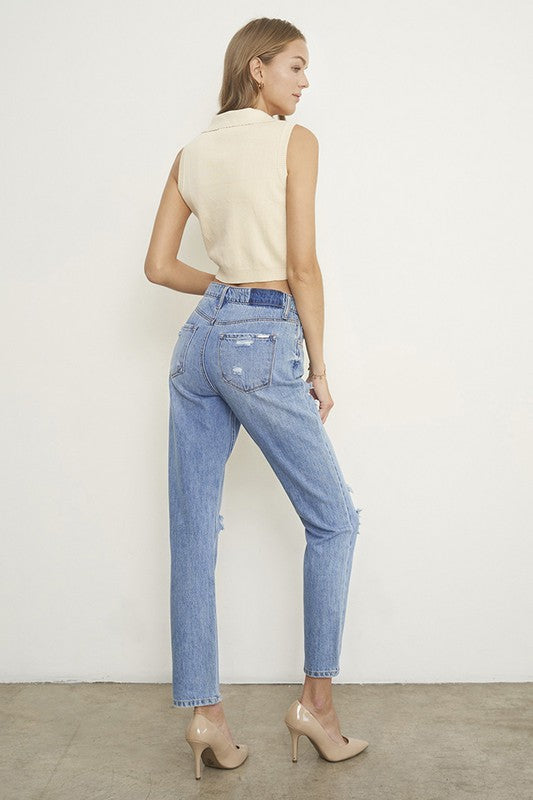 High-rise distressed girlfriend jeans, medium wash, rear view with back seam and pockets