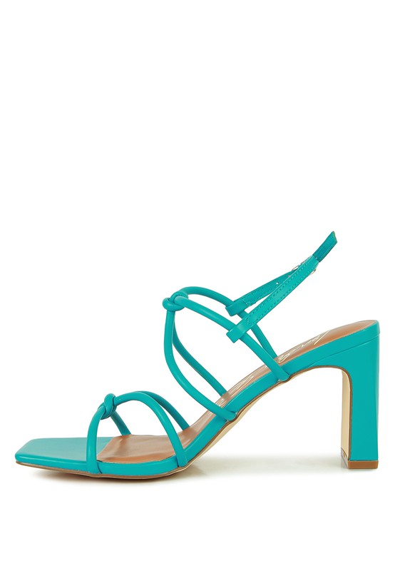 Teal knotted-strap block heel sandals with crisscross ankle straps