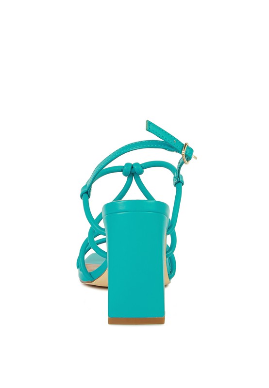 Teal block heel sandal with open toe and knotted ankle wrap straps