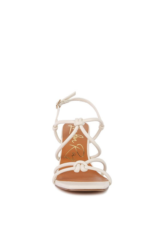 Cream knotted strap block-heel sandal, open toe and crisscross upper