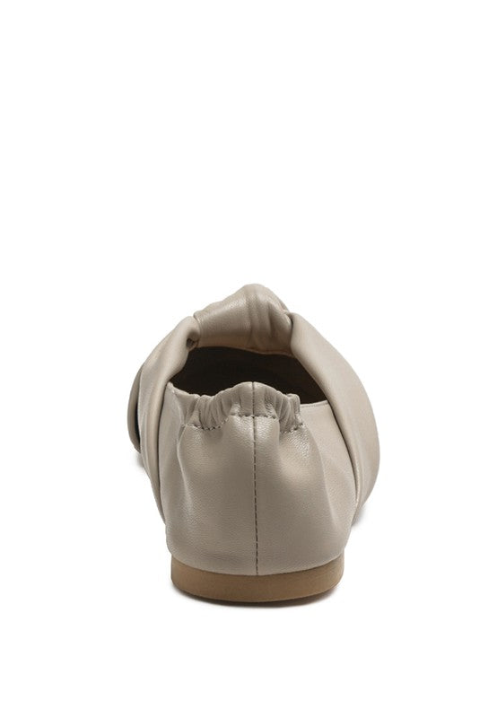 Cream ballet flats heel view with elastic collar and smooth leather upper