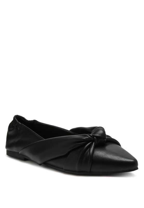 Black leather ballet flats with tied knot detail over the toe cap