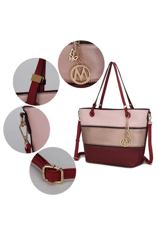 Burgundy tote with blush and gold “M” logo details; shows adjustable strap and hardware