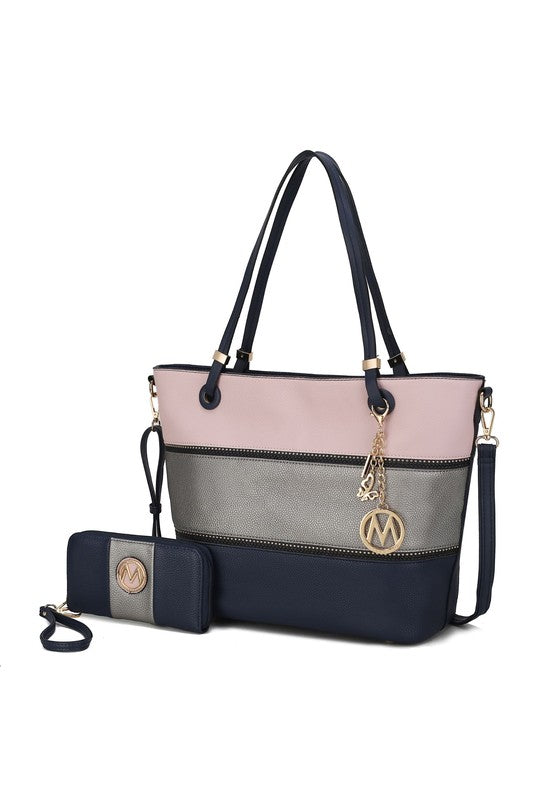 Navy and blush colorblock tote with top zip, gold chain key fob, and matching wristlet