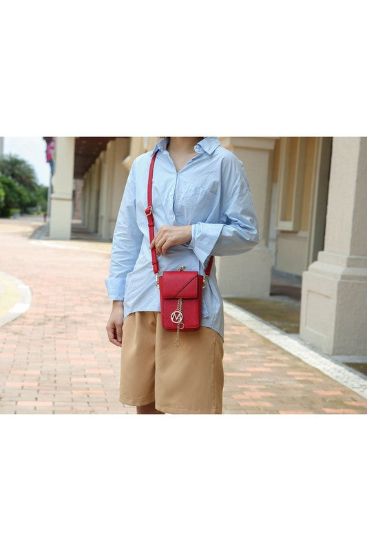 Red crossbody & wristlet worn with long strap; flap front with logo charm and gold trim.