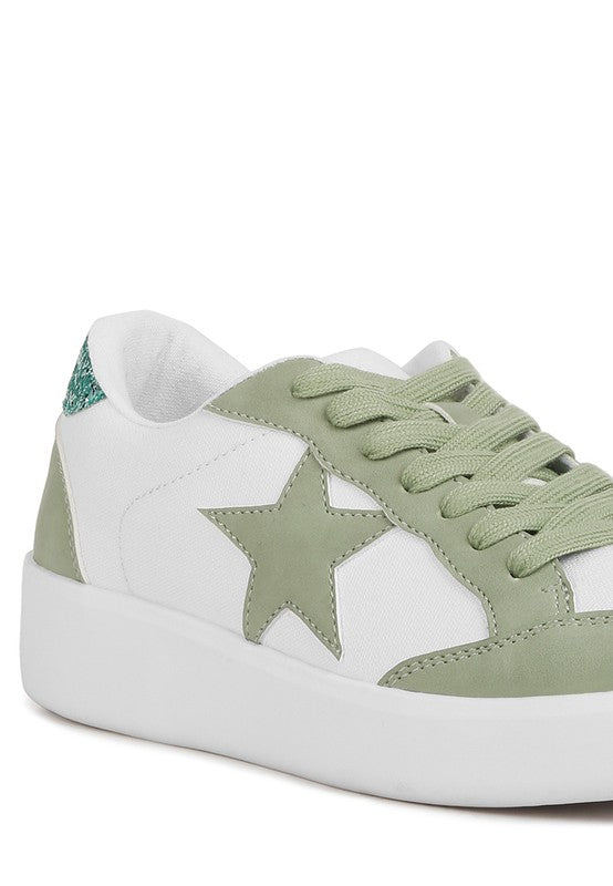 White and green Perry sneakers with large green star applique and lace-up front