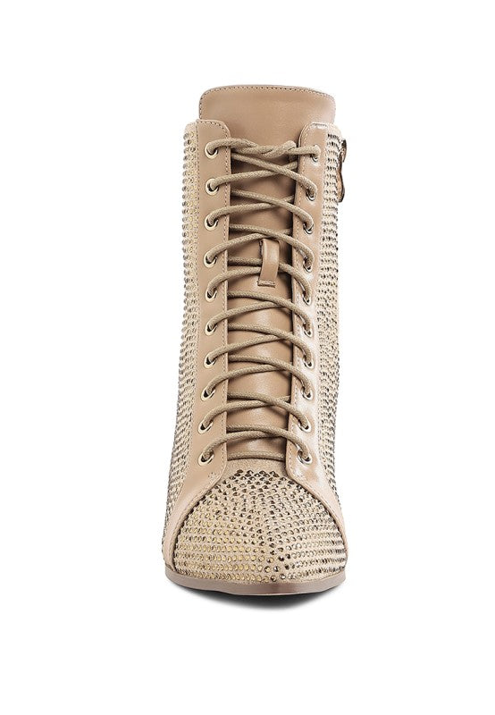 Beige rhinestone ankle boots with lace-up closure and padded ankle collar