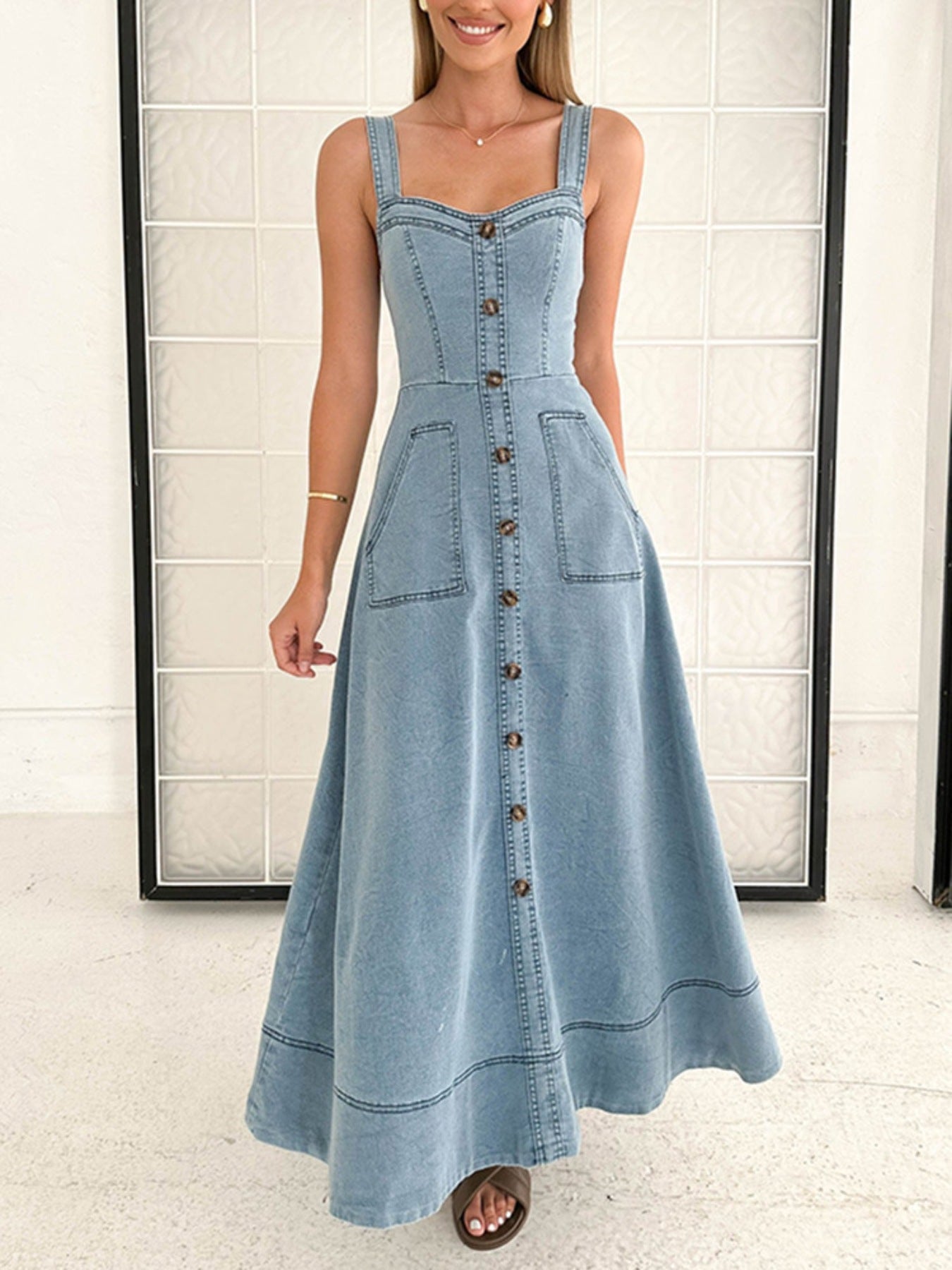 Light blue denim A-line dress with button front, square neckline, and contrast topstitching