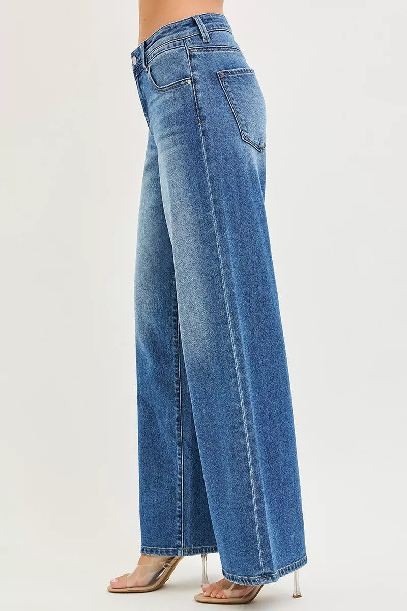 Medium wash blue jeans with back yoke and back pocket stitch detail, wide-leg fit