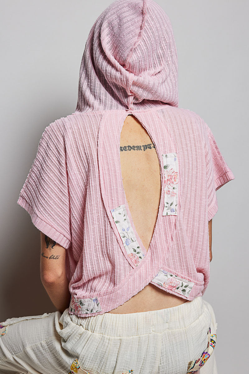 Soft Pink top with open back cutout and floral panel accents