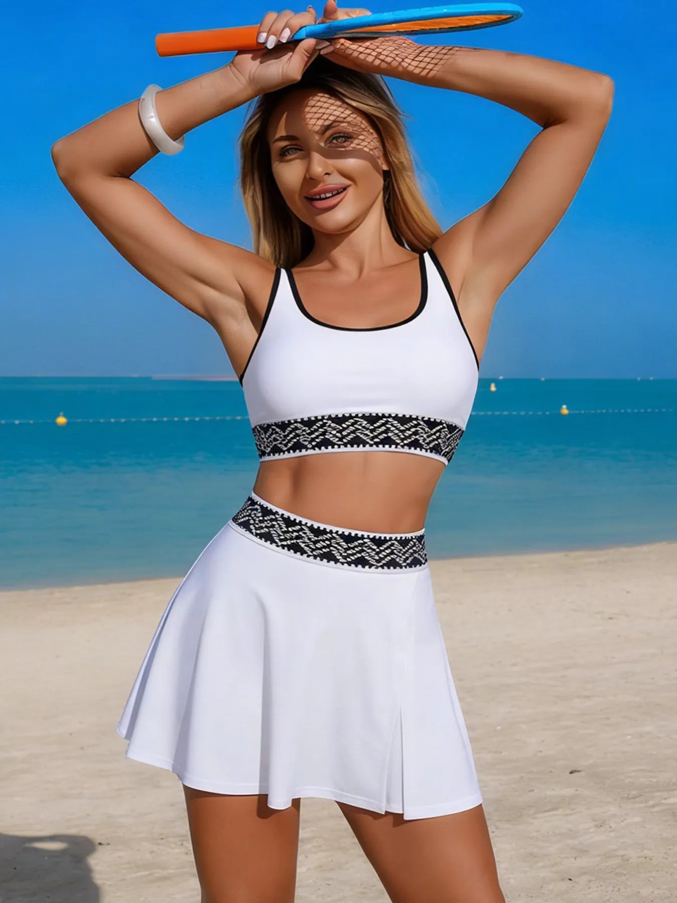 White contrast-trim tank and skort swimsuit with patterned band under the bust