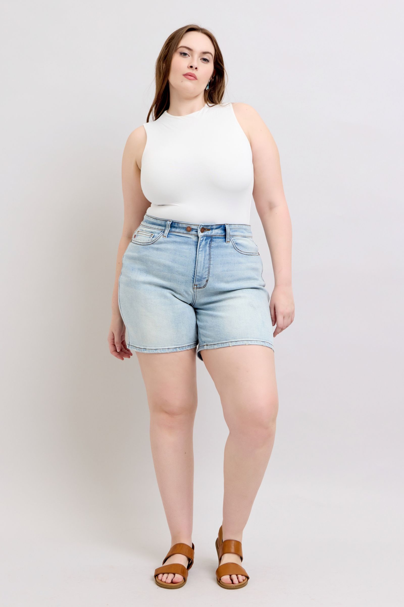 Light-wash denim 2-button shorts with front pockets and belt loops, front view