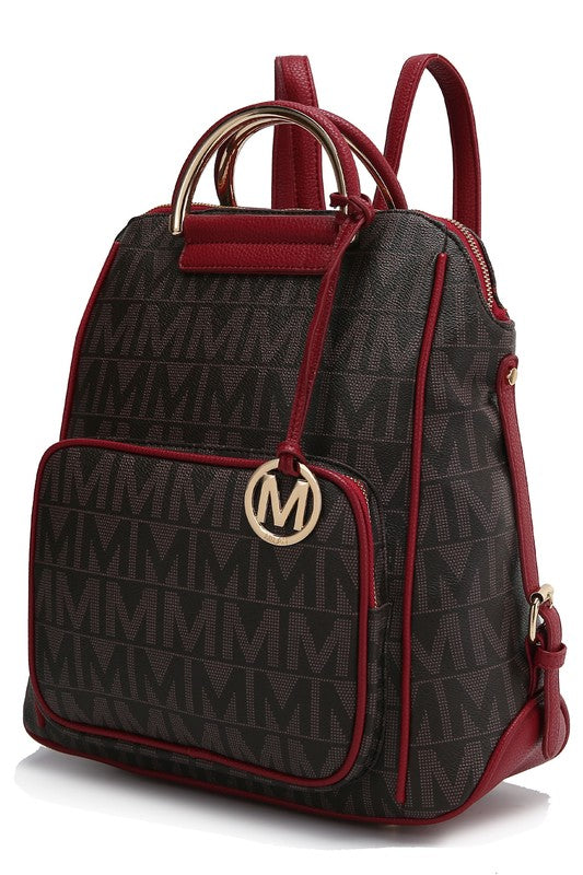 Burgundy Cora Milan backpack with side zipper details and circular logo charm