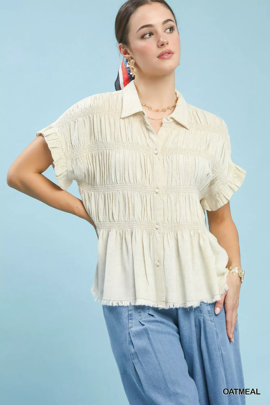 Oatmeal smocked linen-blend shirt with collared button front and short sleeves