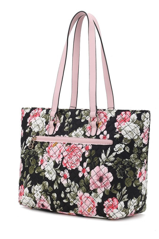 Quilted tote bag with pink handles, black base and floral print with front zip