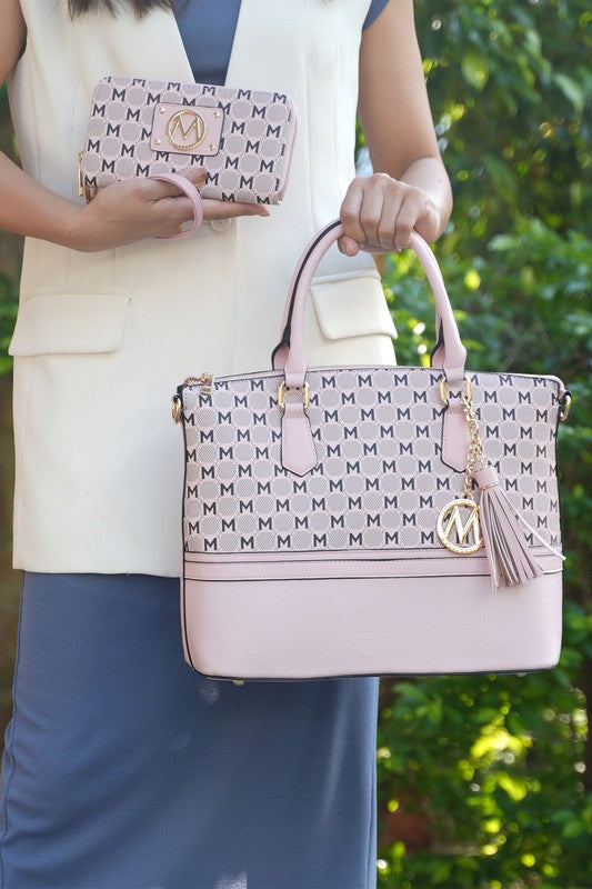 Blush tote bag with M logo pattern and tassel, plus matching zip wallet pouch