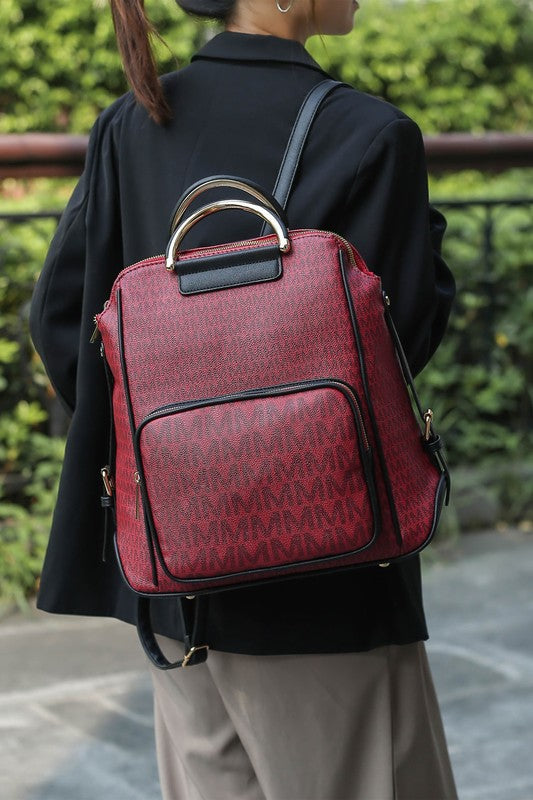 Burgundy printed women’s backpack with top handle, front zip pocket, and black trim